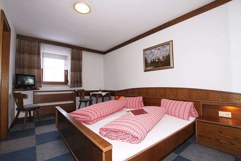 Schlafzimmer im Zimmer 4 im Gasthaus Alpenrose